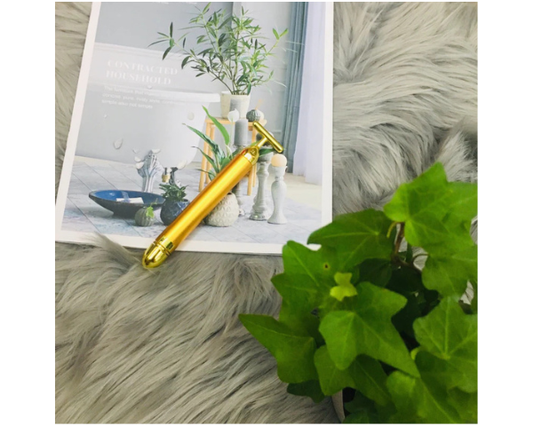 T-shaped 24K Gold facial massage tool for everyday skincare and beauty routines.