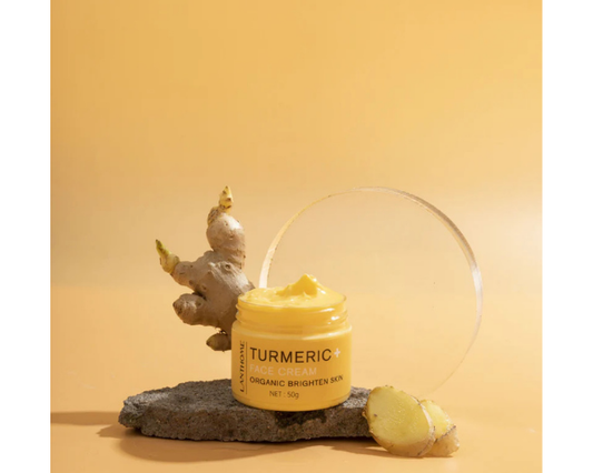 Natural turmeric skincare set with cream and oil for daily facial care.
